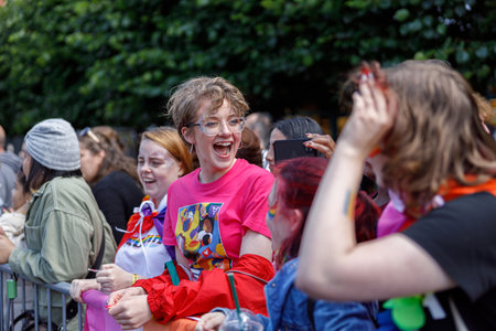 Dublin, Ireland, June 25th 2022. Ireland pride 2022 parade with people walking on one of the main city streetのeditorial素材