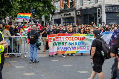 Dublin, Ireland, June 25th 2022. Ireland pride 2022 parade with people walking on one of the main city streetのeditorial素材