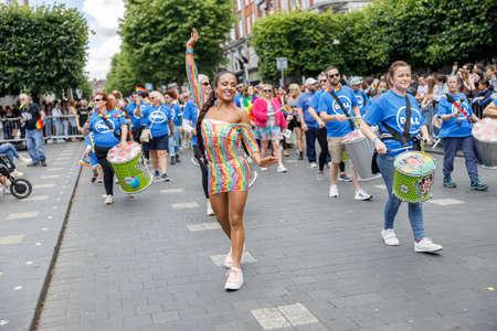 Dublin, Ireland, June 25th 2022. Ireland pride 2022 parade with people walking on one of the main...