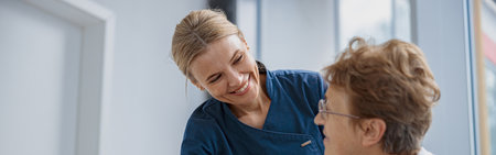 Female patient filling insurance legal document at appointment with doctor in clinicの写真素材