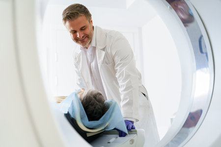 Doctor and female patient in the room of computed tomography at hospital. Healthcare conceptの写真素材