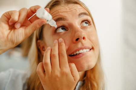 Applying Eye Drops An Essential Routine for Achieving Clear Vision and Ultimate Comfortの写真素材