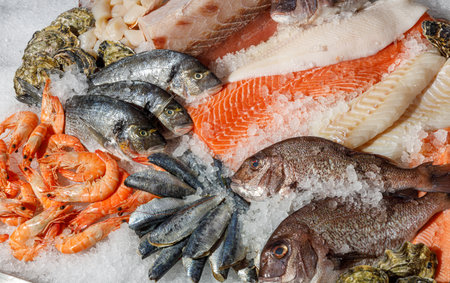 An enticing Fresh Seafood Display, beautifully arranged on ice and showcasing a variety of fishの写真素材