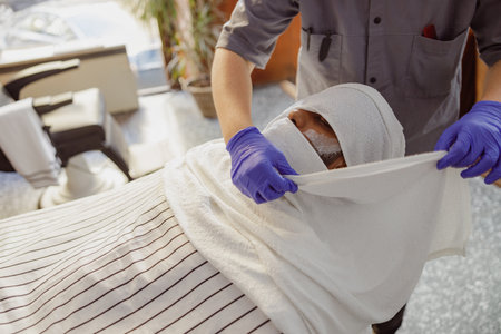 Indulging in a relaxing spa treatment with the utmost professional care for your wellbeingの写真素材