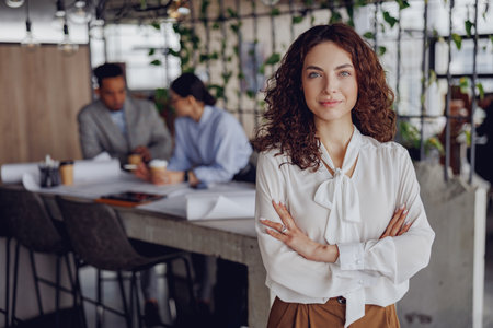 A confident and skilled professional working within a modern and vibrant office environment