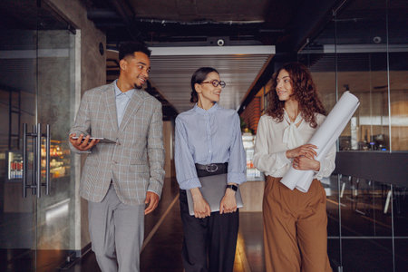 A Collaborative Team Operating Effectively in a Modern Office Environment Settingの写真素材