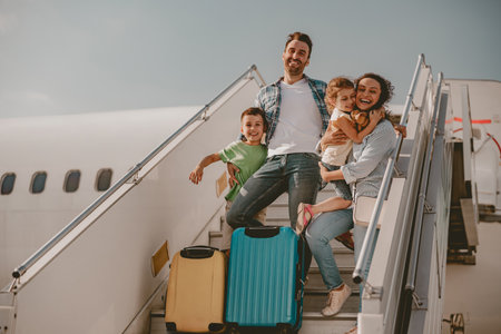 Exciting Family Adventure at the Airport Getting Ready for Takeoff and New Experiencesの写真素材