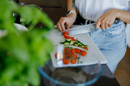 Preparation of Fresh Ingredients in a Modern, WellEquipped Kitchen for Culinary Delightsの写真素材