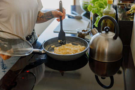 Cooking Up Mouthwatering and Delicious Meals in a Contemporary and Modern Kitchenの写真素材