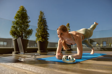 Join an energizing Outdoor Yoga session with a Fitness Wheel to boost your fitness journey