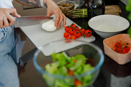 Fresh Cooking Ingredients and Preparation Techniques Utilized in a Modern Kitchen Environment