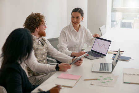 Join us for a professional team meeting featuring an engaging data presentation experienceの写真素材