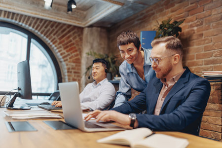 Team Collaboration in the Modern Office Environment to Enhance Productivity and Innovationの写真素材