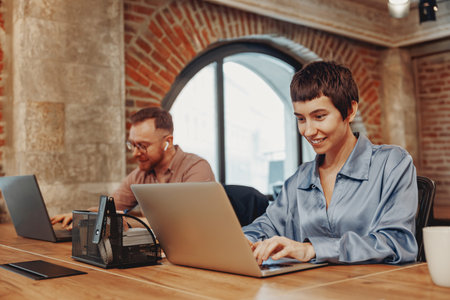 A modern coworking space designed for professionals to collaborate and innovate togetherの写真素材