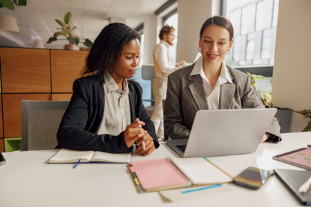 Participating in a Collaborative Business Meeting within a Modern Office Environment is essentialの写真素材