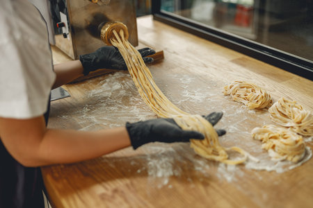 Handmade Pasta Preparation Techniques Emphasizing Artisan Skills in a Culinary Setting for All
