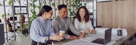 Engaging in a Collaborative Meeting within a Modern Office Space for Effective Cooperation