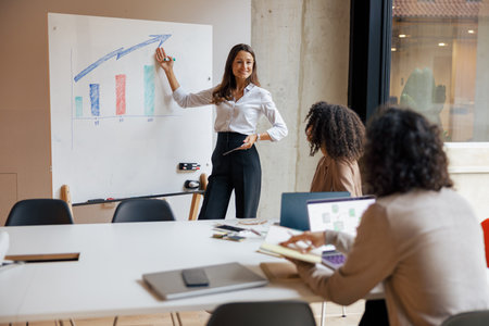Engaging Business Presentation Featuring Data Visualization Within a Modern Office Settingの写真素材