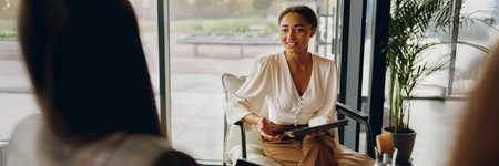 Professional Meeting Taking Place in a Modern Office Setting Focused on Collaboration and Successの写真素材