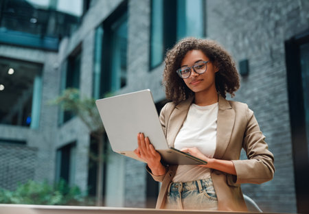 woman carefully assesses campaign results to effectively plan subsequent activities and strategiesの写真素材