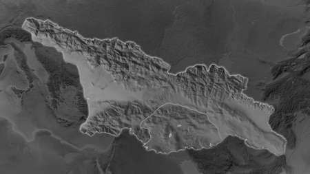 Georgia area enlarged and glowed on a darkened background of its surroundings. Grayscale bumped elevation mapの写真素材