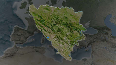Bosnia and Herzegovina area enlarged and glowed on a darkened background of its surroundings....