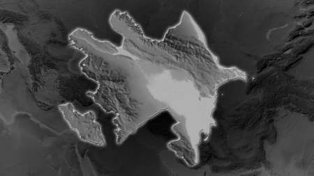 Azerbaijan area enlarged and glowed on a darkened background of its surroundings. Grayscale bumped...