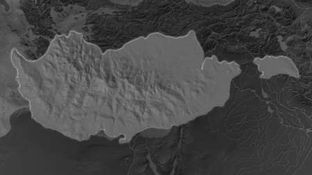 Cyprus area enlarged and glowed on a darkened background of its surroundings. Bilevel bumped elevation mapの写真素材