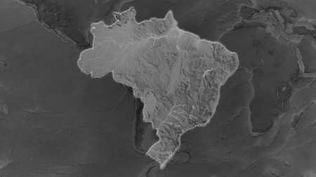 Brazil area enlarged and glowed on a darkened background of its surroundings. Grayscale bumped elevation mapの写真素材