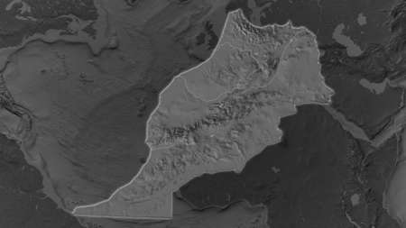 Morocco area enlarged and glowed on a darkened background of its surroundings. Bilevel bumped elevation mapの写真素材