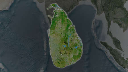 Sri Lanka area enlarged and glowed on a darkened background of its surroundings. Satellite imageryの写真素材