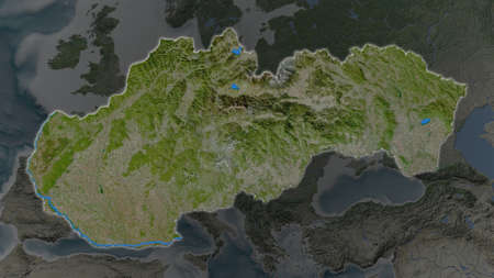 Slovakia area enlarged and glowed on a darkened background of its surroundings. Satellite imageryの写真素材