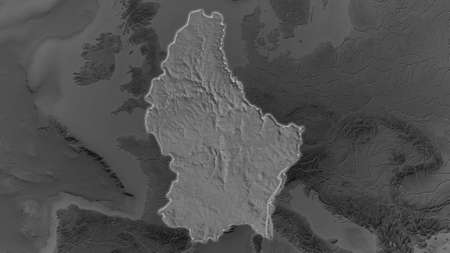 Luxembourg area enlarged and glowed on a darkened background of its surroundings. Grayscale bumped elevation mapの写真素材