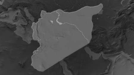 Syria area enlarged and glowed on a darkened background of its surroundings. Bilevel bumped elevation mapの写真素材