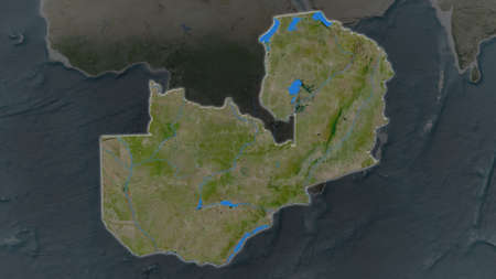 Zambia area enlarged and glowed on a darkened background of its surroundings. Satellite imageryの写真素材