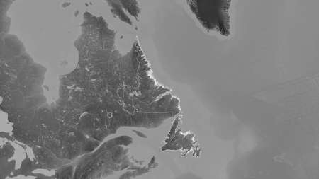 Newfoundland and Labrador, province of Canada. Grayscaled map with lakes and rivers. Shape outlined...