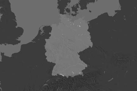 Shape of Germany separated by the desaturation of neighboring areas. Bilevel elevation map. 3D renderingの写真素材