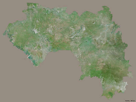 Shape of Guinea with its capital isolated on a solid color background. Satellite imagery. 3D renderingの写真素材