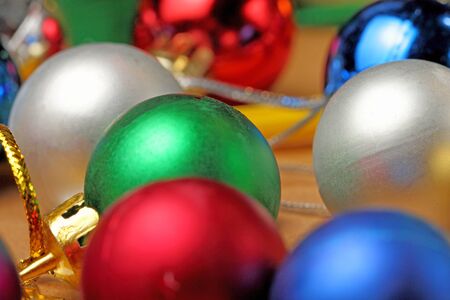 Multi-colored Christmas balls close-up on a craft background.の写真素材