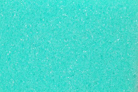 Foamed surface, as a background, emerald color, close-up. Flat lay, top view, copy space.の写真素材