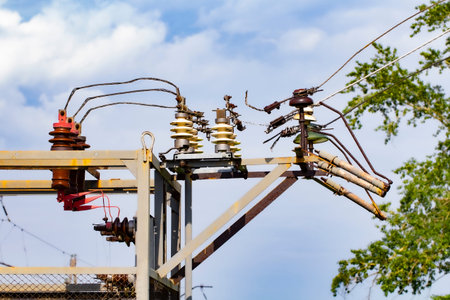 Old power lines and electrical equipment, vintage industrial electricity.