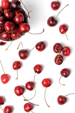 Ripe organic cherries pattern on a white background. Top view, flat lay, white background.の写真素材
