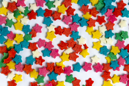 Sugar glazed stars texture, close-up, top view. Wonderful holidays or festive background.の写真素材