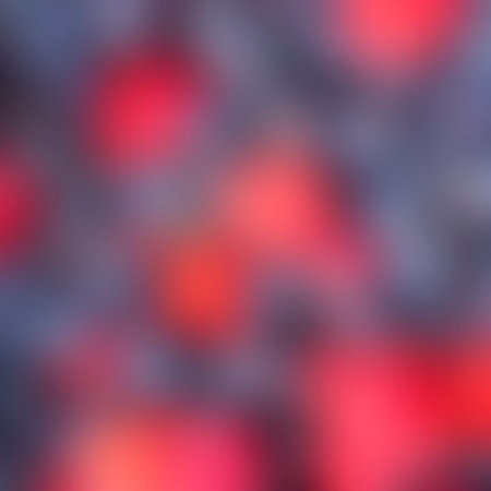 Abstract blurred background with red and blue tones.