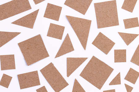 Pattern of simple craft paper shapes isolated on whiteの写真素材