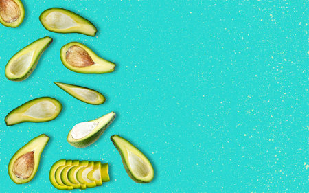 avocado slices and place for text. Top view, copy space, vegan dishes.