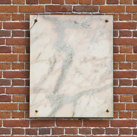 Board mockup. Old marble board on a brick wall, place for text or image, copyspace.の写真素材