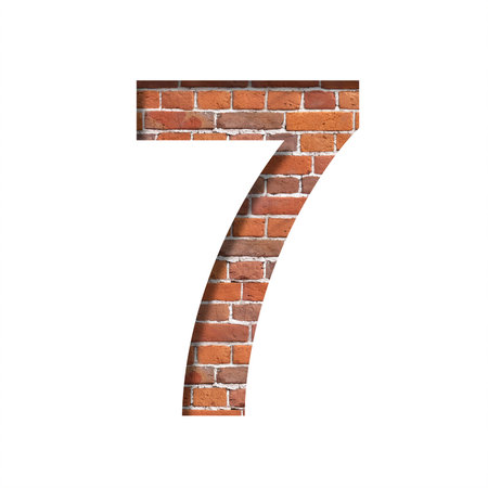 Font on brick texture. Digit seven, 7, cut out of paper on a background of real brick wall....