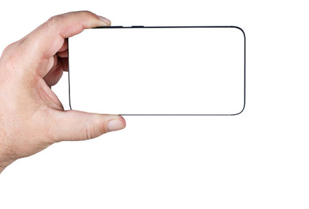 Male hand with a phone, white screen background for text, copy space, concept for an advertising...