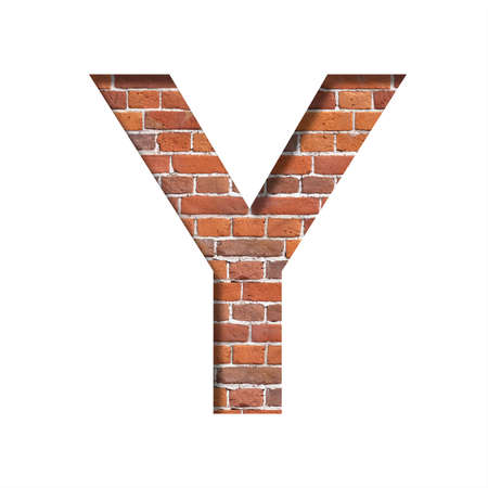 Font on brick texture. Letter Y, cut out of paper on a background of real brick wall. Volumetric white fonts set.の写真素材